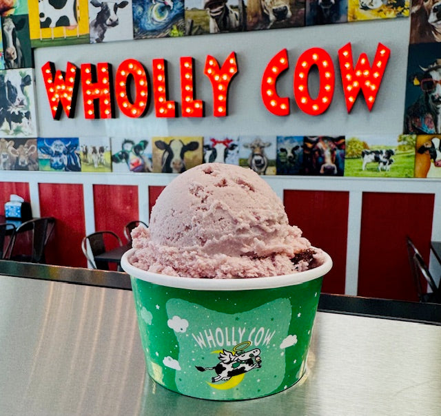 Wholly Cow Ice Cream shop with a scoop of Black Cherry Ice Cream